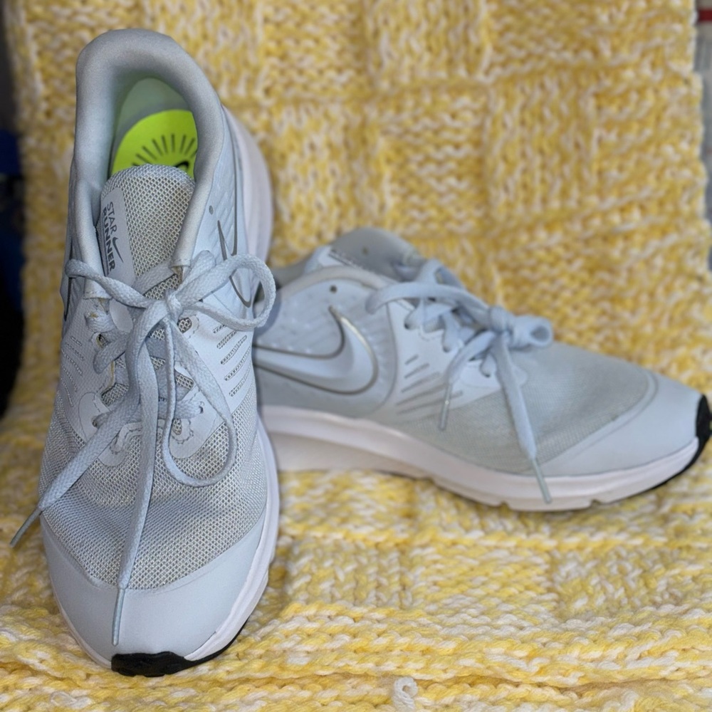 Nike kid’s light blue size 6Y Running Shoes